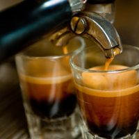 a glass cup on a table